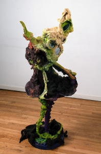 Fashionista 2023, paper, wool, plastic, mirrors, metal, wood, crushed glass, mirrors, and pigments 56 x 25x 24 inches