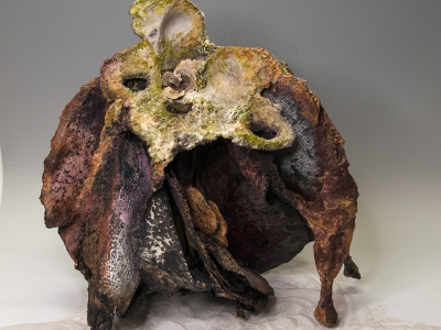 BONE LEGS,  2021, Mixed media sculptural book with carborundum prints on paper, preserved fungi, wood, plastic, parabolic mirror, sand, ground glass, and pigments. 24 x 20 x 20 inches