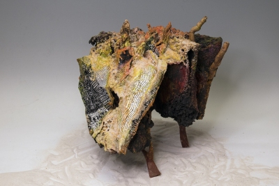 TUBER, 2021, Mixed media sculptural book with carborundum prints on paper, wood, plastic, sand, ground glass, and pigments.14 x 17 x 15 inches.